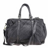 Woven leather handbag with adjustable shoulder strap